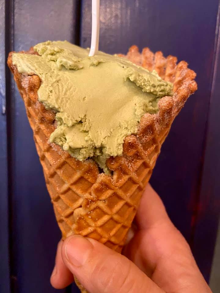 green tea lavender ice cream in a biscochito waffle cone