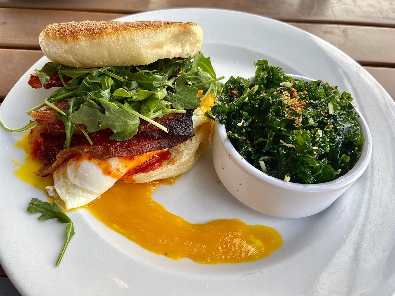  breakfast sandwich make with bacon, gruyere cheese, and arugula....